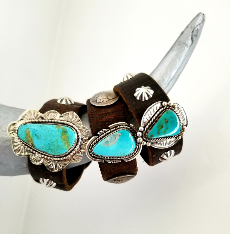 Artist: Linda Lanier.
Jjewelry designs in silver, leather and turquoise capture an earthy elegance