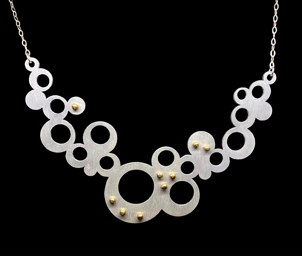 Steel jewelry by Kelly Carlson-Reddig
